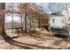 Large backyard with trampoline, fire pit, and a hammock at 9919 Bridgewater Pointe, Villa Rica, GA 30180