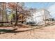 Spacious backyard showcasing a trampoline and expansive lawn at 9919 Bridgewater Pointe, Villa Rica, GA 30180