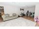 Finished basement with an open floor plan and large rug at 9919 Bridgewater Pointe, Villa Rica, GA 30180