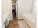 Bathroom with a bathtub and access to a walk-in closet at 9919 Bridgewater Pointe, Villa Rica, GA 30180