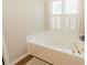 Relax in this large bathtub with updated fixtures at 9919 Bridgewater Pointe, Villa Rica, GA 30180