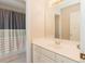 Bathroom with shower/tub combo, vanity, and neutral decor at 9919 Bridgewater Pointe, Villa Rica, GA 30180