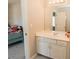 Bathroom with vanity and view into adjoining bedroom at 9919 Bridgewater Pointe, Villa Rica, GA 30180
