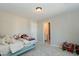 Light and bright bedroom with a view of the attached bathroom at 9919 Bridgewater Pointe, Villa Rica, GA 30180