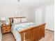 Basement bedroom with wood frame bed and calming decor at 9919 Bridgewater Pointe, Villa Rica, GA 30180