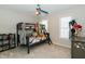 bedroom with bunk beds, bookcase, and ceiling fan at 9919 Bridgewater Pointe, Villa Rica, GA 30180