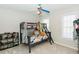 bedroom with bunk beds, bookcase, and ample natural light at 9919 Bridgewater Pointe, Villa Rica, GA 30180