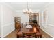 Formal dining room with hardwood floors and a chandelier at 9919 Bridgewater Pointe, Villa Rica, GA 30180
