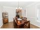 Bright dining room with hardwood floors and a chandelier at 9919 Bridgewater Pointe, Villa Rica, GA 30180