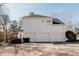 Three-car garage with ample parking space at 9919 Bridgewater Pointe, Villa Rica, GA 30180