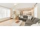 Spacious living room with hardwood floors and views to kitchen at 9919 Bridgewater Pointe, Villa Rica, GA 30180