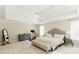 Spacious main bedroom with high ceilings, carpeted floors, and ensuite bathroom at 9919 Bridgewater Pointe, Villa Rica, GA 30180