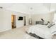 Large main bedroom featuring a tray ceiling and ensuite bathroom access at 9919 Bridgewater Pointe, Villa Rica, GA 30180