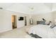 Large main bedroom with high ceilings, carpeted floors, and ensuite bathroom at 9919 Bridgewater Pointe, Villa Rica, GA 30180
