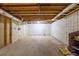 Unfinished basement area with exposed beams at 215 Silver Creek Ln, Stockbridge, GA 30281