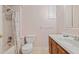 Basement bathroom with shower/tub and wood vanity at 215 Silver Creek Ln, Stockbridge, GA 30281