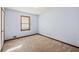 Spacious bedroom with neutral walls and carpeted floor at 215 Silver Creek Ln, Stockbridge, GA 30281