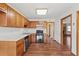 Classic kitchen with wood cabinets and laminate countertops at 215 Silver Creek Ln, Stockbridge, GA 30281