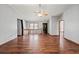 Open living room with hardwood floors and loft area at 215 Silver Creek Ln, Stockbridge, GA 30281
