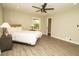 Main bedroom with ceiling fan and window views at 2751 Colonial Dr, College Park, GA 30337