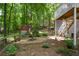 Landscaped backyard with fire pit and playset, ideal for entertaining at 4848 Green Forest Nw Ct, Acworth, GA 30102