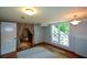 Finished basement with two large windows, new flooring, and access to other rooms at 4848 Green Forest Nw Ct, Acworth, GA 30102