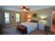 Spacious main bedroom with carpeted floors, ample natural light, and room for furniture at 4848 Green Forest Nw Ct, Acworth, GA 30102