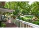 Deck overlooking a wooded backyard and neighborhood view at 4848 Green Forest Nw Ct, Acworth, GA 30102
