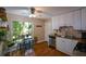 Well-lit kitchen boasts granite countertops, white cabinets, and a view of the backyard at 4848 Green Forest Nw Ct, Acworth, GA 30102