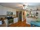 Open concept kitchen with stainless steel appliances and plenty of cabinet storage at 4848 Green Forest Nw Ct, Acworth, GA 30102