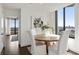 Cozy dining nook offers great natural light and views from large windows at 2660 Peachtree Nw Rd # 25H, Atlanta, GA 30305