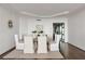 Dining room with neutral decor, stylish furnishings, and hardwood floors at 2660 Peachtree Nw Rd # 25H, Atlanta, GA 30305
