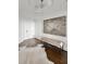 Hallway features hardwood floors, decorative ceilings, and stylish decor at 2660 Peachtree Nw Rd # 25H, Atlanta, GA 30305