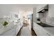 This modern kitchen is equipped with stainless steel appliances and plenty of storage at 2660 Peachtree Nw Rd # 25H, Atlanta, GA 30305