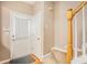 Entryway with hardwood floors, staircase, and white door at 3712 Berkeley Xing, Duluth, GA 30096