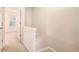 Hallway with a carpet floor and white trim with a view into another room at 3712 Berkeley Xing, Duluth, GA 30096