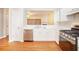 Clean, bright kitchen featuring stainless appliances and a gas range at 3712 Berkeley Xing, Duluth, GA 30096