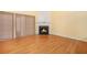 Spacious living room with hardwood floors and a cozy fireplace at 3712 Berkeley Xing, Duluth, GA 30096