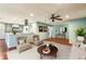 Inviting living room and kitchen with an island, seamlessly connected for modern living at 64 Devon Ln, Avondale Estates, GA 30002