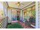 Comfortable screened porch featuring outdoor seating with views through sliding glass doors at 64 Devon Ln, Avondale Estates, GA 30002