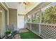 Relaxing screened porch with flooring and cozy seating, perfect for enjoying the outdoors at 64 Devon Ln, Avondale Estates, GA 30002