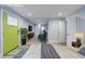 Virtually staged main bedroom with lime green door and gray walls at 106 Adair Ave, Atlanta, GA 30315