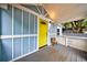 Inviting front porch with grey wood flooring and white railings at 106 Adair Ave, Atlanta, GA 30315