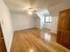Spacious bedroom with hardwood floors and large windows at 10995 Parsons Rd, Johns Creek, GA 30097