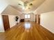 Large bonus room with hardwood floors and ample natural light at 10995 Parsons Rd, Johns Creek, GA 30097