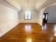 Formal dining room with hardwood floors and wainscoting at 10995 Parsons Rd, Johns Creek, GA 30097