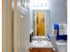 Bathroom with sink, mirror, and blue towels at 3756 Harvest Dr, Atlanta, GA 30034