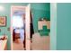 Bathroom with tub, view of bedroom, and teal walls at 3756 Harvest Dr, Atlanta, GA 30034