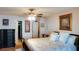 Main bedroom with a king-size bed and dark wood dresser at 3756 Harvest Dr, Atlanta, GA 30034