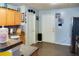 Kitchen with light wood cabinets, stainless steel appliances and door to outside at 3756 Harvest Dr, Atlanta, GA 30034
